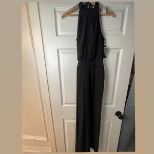 A black sleeveless jumpsuit new with tags.